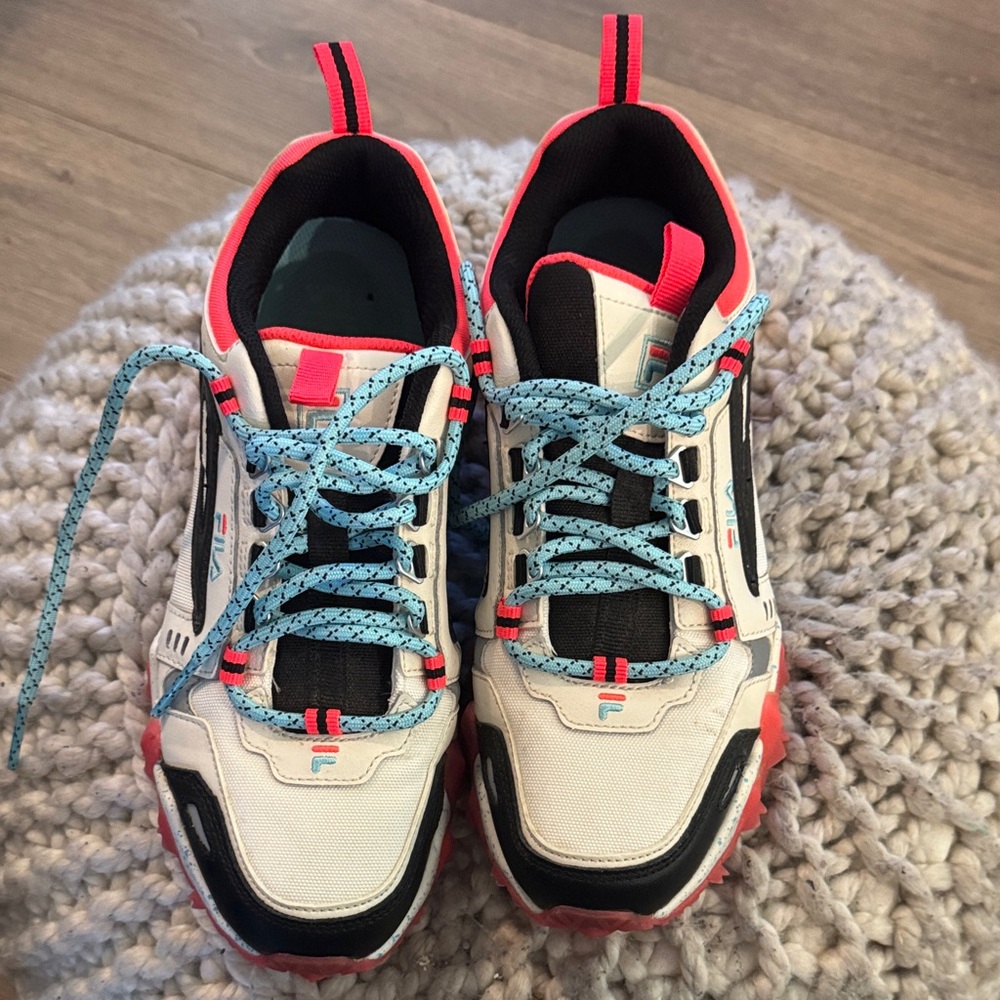 Fila White and Black Athletic Shoes with Red and Blue Accents